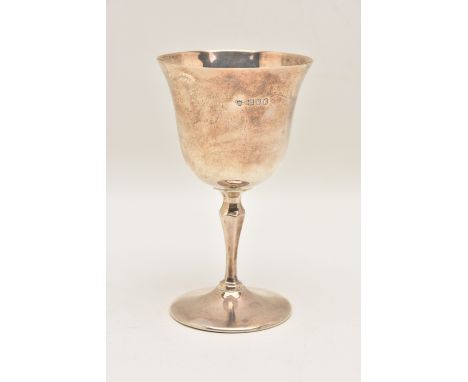 AN EARLY 20TH CENTURY SILVER GOBLET, polished cup with light gilt interior, engraved initials dated 1908, tapered stem and ro