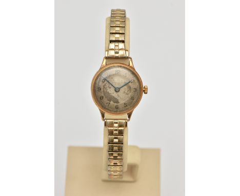 A LADIES 9CT GOLD WRISTWATCH, manual wind watch, round discoloured silver dial signed 'Buren', Arabic numerals, personal engr