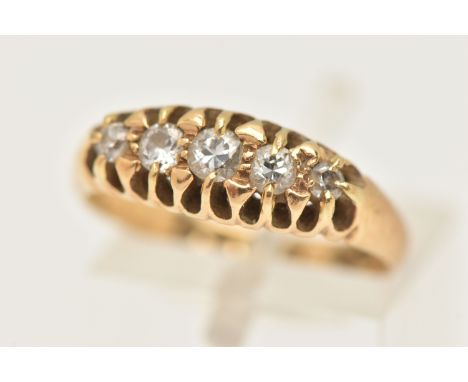 AN EARLY 20TH CENTURY 18CT GOLD DIAMOND BOAT RING, set with a row of five graduating old cut and single cut diamonds, to the 