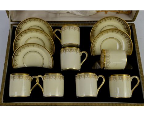 Ye Olde English Grosvenor cased set of coffee cans and saucers, lacking one saucer but with one extra cup, in cream ground wi