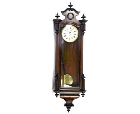Mahogany Vienna style regulator wall clock, white enamel dial with Roman numerals, with pendulum and winder, H123cm          