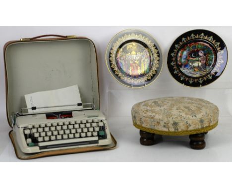 Typewriter in leather case, circular footstool and two 'Magical Fairy Tales From Old Russia' collectors plates (4)           