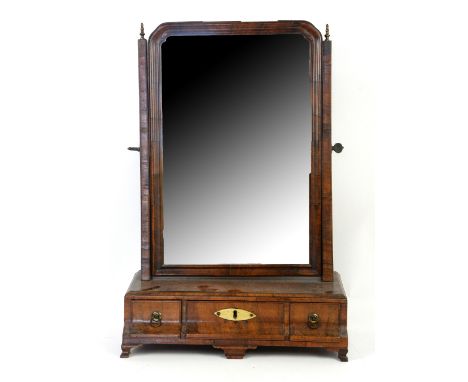 Georgian walnut toilet mirror, with two short and one long drawer above bracket feet, H59 x W40cm           