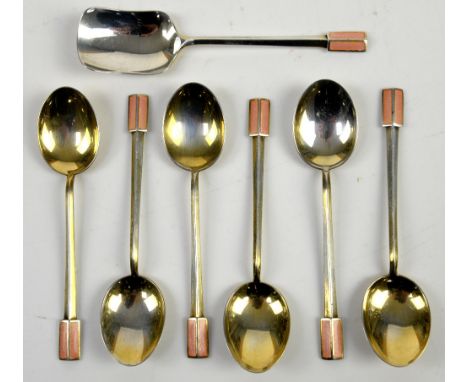 Art Deco seven piece silver and enamel spoon set consisting of one sugar/caddy spoon and six tea spoons by Charles Robathan, 