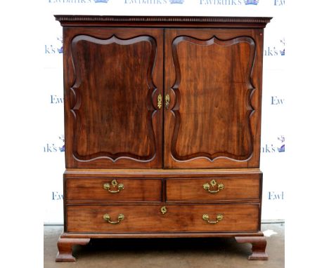 19th mahogany linen press with dentil cornice and two short drawers above one long drawer on ogee bracket feet. 167H x 147W x