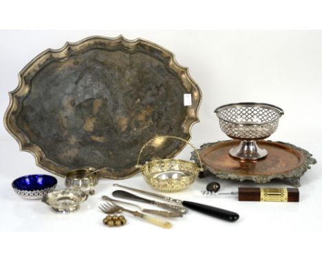A Georgian silver caddy spoon, a pair of silver miniature candlesticks, a silver cup, white metal box and cover, and a quanti