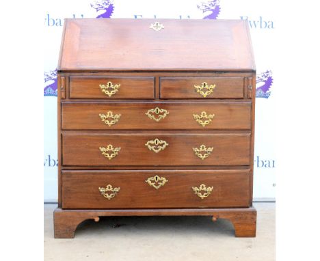 19th century mahogany bureau the fall front with fitted interior above two short over three long graduated drawers on bracket