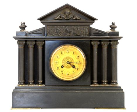 Late 19th century black slate mantel clock of architectural form, gilt dial with Arabic numerals, twin train movement strikin