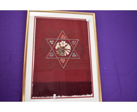 An interesting framed piece of embroidery,possibly a former scarf, shawl or clerical item?? Filigree edging which is surround