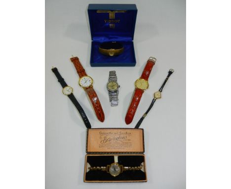 A ladies gold plated Tissot bracelet watch with original box, a gentleman's Roamer 17 jewel watch with subsidiary seconds dia