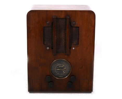 Lissen valve radio in stained oak ply case, serial number LN8113 10982, fitted valves, Magnavox speaker, 47cm tall.