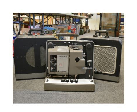 Bell &amp; Howell Filmosound TQI 16mm projector, with a pair of Bell &amp; Howell speakers in carry cases.