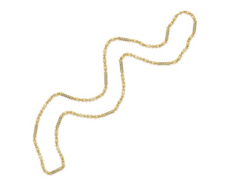 ENAMEL-SET LONGCHAINOf fancy linking, accented by batons decorated with black and white enamel,  length approx. 81.0cm For fu