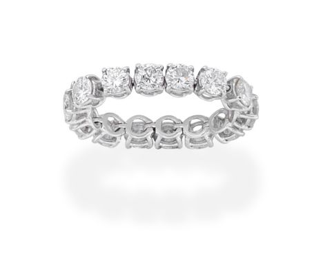 DIAMOND ETERNITY RINGThe flexible hoop set throughout with brilliant-cut diamonds,  diamonds approx. 2.80cts total, ring size