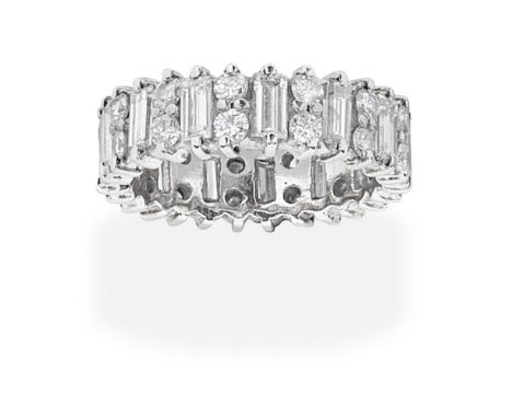 DIAMOND ETERNITY RINGSet throughout with alternating baguette and brilliant-cut diamonds, diamonds approx. 3.90cts total,  ri