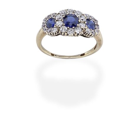 SAPPHIRE AND DIAMOND CLUSTER RING, 19TH CENTURYSet with three cushion-shaped sapphires, within cushion-shaped diamond surroun