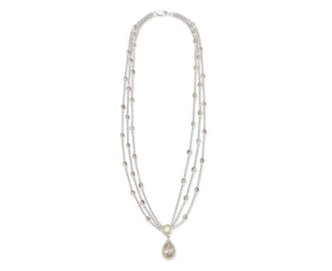 COLOURED DIAMOND PENDANT NECKLACEThe pear-shaped diamond of brown tint within a brilliant-cut diamond surround of yellow tint