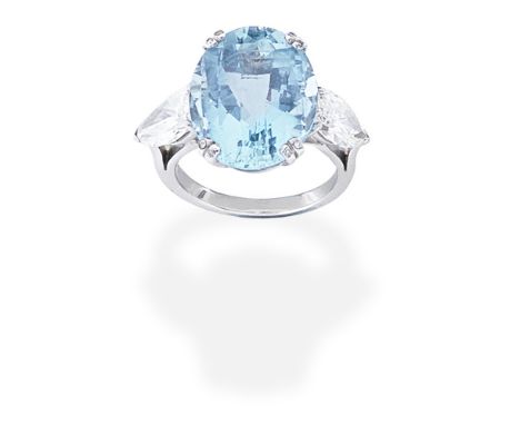 AQUAMARINE AND DIAMOND RINGThe oval checkerboard-cut aquamarine, between pear-shaped diamond shoulders,  diamonds approx. 3.0