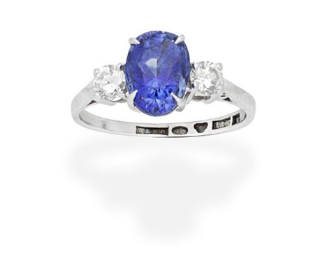 SAPPHIRE AND DIAMOND RINGThe oval-cut sapphire between  brilliant-cut diamond shoulders,  ring size approx. MFootnotes:Accomp