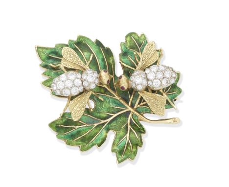 ENAMEL AND DIAMOND BEE BROOCHDesigned as two bees, sitting atop a green enamel leaf, the heads and bodies set with brilliant-