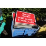 Dolav containing large quantity of road signs.