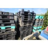 Quantity of plastic pallets.
