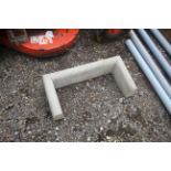 Concrete drain surround.