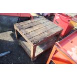 Heavy duty wheeled shelving unit.