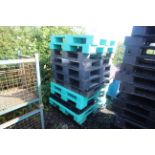 Quantity of plastic pallets.