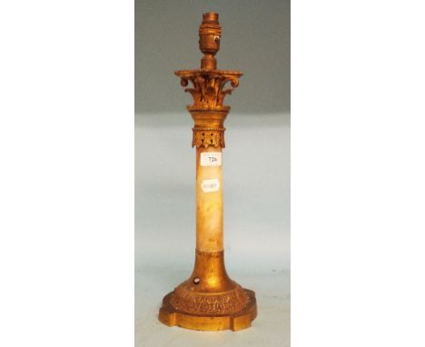 A gilt metal and alabaster table lamp, 41 cm high (excluding fitting)