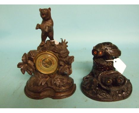 A Black Forest style carved wood inkwell, decorated an owl and owlets, 14 cm high, and a similar desktop barometer (2) Condit