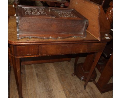 A 19th century mahogany tea table, 92 cm wide, a carved oak hanging corner cupboard, a similar cabinet, and a standard lamp, 