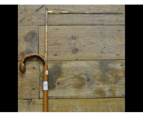 A bamboo horse measuring stick, with silver coloured metal mounts and a spirit level, 95 cm long