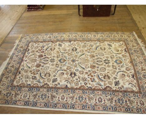A Persian Tabriz carpet, 306 x 201 cm