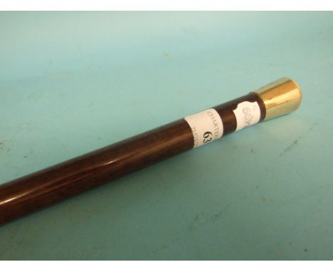 A snakewood walking stick, with an 18ct yellow gold cap