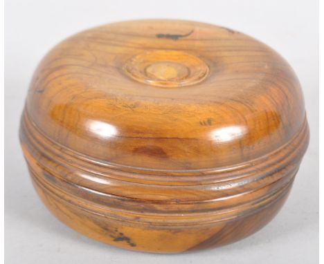 A pair of Jerusalem olive wood turned travelling candle sticks, each well with removable screw-in candlestick with urn-shaped