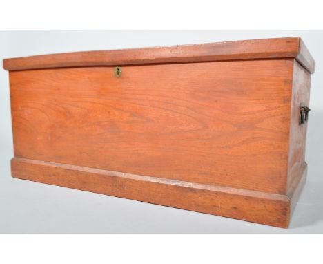 A late Victorian stained pine trunk travelling trunk, with two handles, 40.5cm high x 94cm wide
