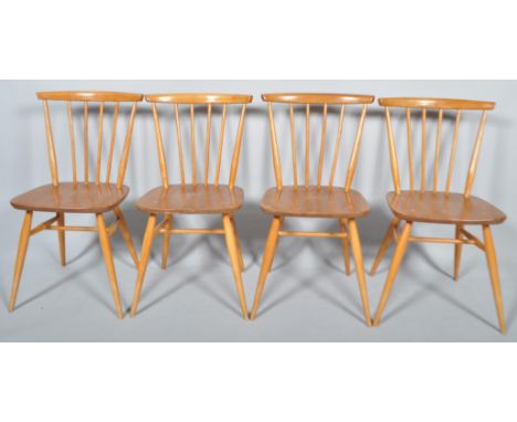 Lucian Ercolani - Ercol - 737 - A rare set of 1970's retro vintage beech and elm stick back dining chairs having a six spindl