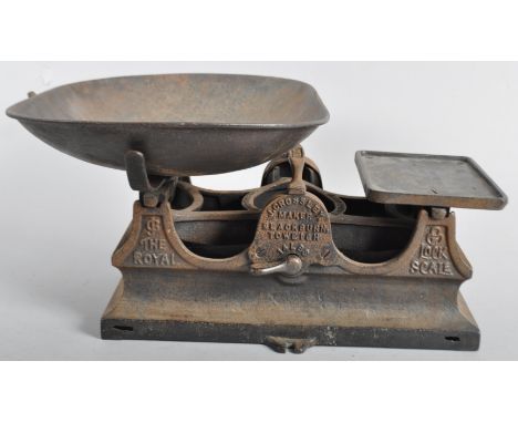 A James Crossley (Blackburn) set of cast iron shop weighing scales, stamped marks for 'The Royal Lock Scale', the tray 38cm w