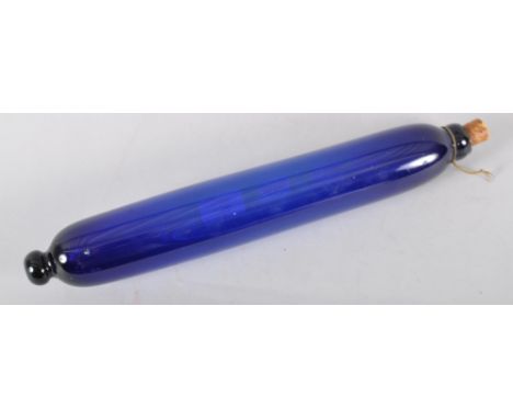 A 19th century Bristol Blue glass rolling pin, 38cm long