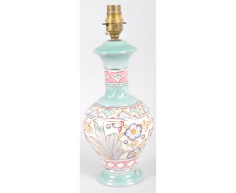 A Charlotte Reed Bursley ware 'Tulip' pattern lamp base, printed and WIG moulded marks, tube lined and decorated with a broad