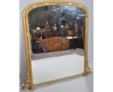 A Victorian gilt wood over mantel mirror, of arched rectangular reeded form, 130cm high x 127cm wide
