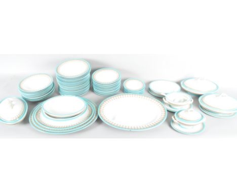 A Royal Worcester turquoise bordered  part-dinner service, late 19th century, printed puce and brown registration lozenge, to