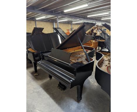 Steinway (c1969) A 7ft 5in Model C grand piano in a bright ebonised case on square tapered legs. There is VAT on this Lot.&nb