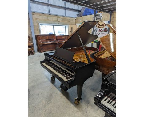 Steinway (c1985) A 6ft 11in Model B grand piano in a satin ebonised case on square tapered legs. There is VAT on this Lot.&nb