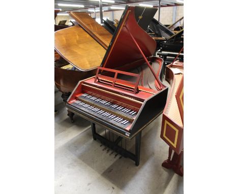 Gaveau No 49 (c1923) A 7ft double manual harpsichord in a black lacquered case with brass strapwork hinges, raised on square 