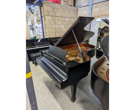 Steinway (c1986) A 6ft 11in Model B grand piano in a bright ebonised case on square tapered legs. There is VAT on this Lot.&n
