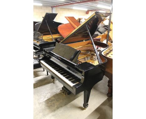 Steinway (c2008) A 6ft 11in Model B grand piano in a bright ebonised case on square tapered legs; together with a matching st
