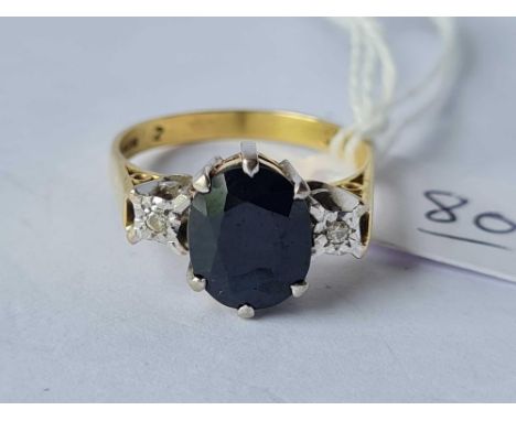 A sapphire and diamond 18ct gold three stone ring size Q 5.1g inc