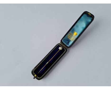 Victorian gold baroque pearl novelty stick pin depicting a face with demantoid garnet eyes in fitted box